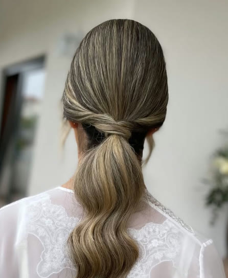 Penteado de noiva feito no salão Rosani