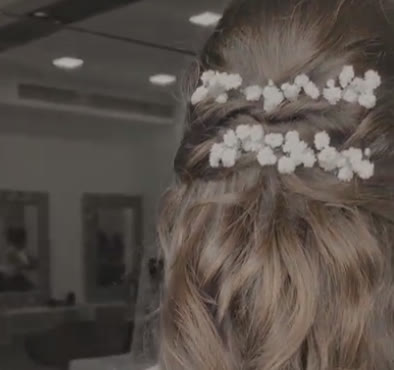 Penteado de noiva feito no salão Rosani